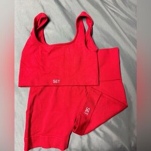 set active red bra and biker short workout set